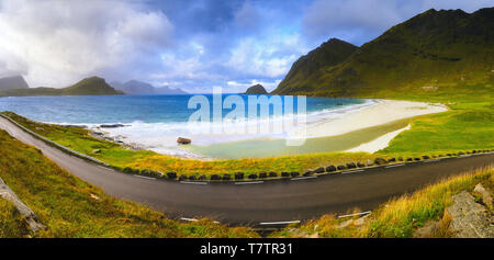 Summer panoramic view of Haukland Beach and road in Norway, Lofoten islands, near Leknes, Nordland Stock Photo