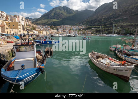 Fishermen in their boats at the picturesque fishing village of Castellammare del Golfo in north western Sicily. Stock Photo