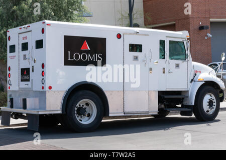 TUCSON, AZ/USA APRIL 11, 2019: Loomis armed security vehicle and trademark logo. Stock Photo