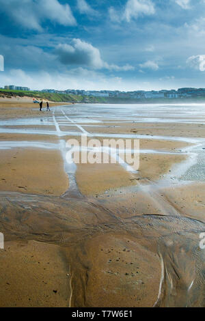 Tire tracks left on Fistral Beach at low tide in Newquay in Cornwall. Stock Photo