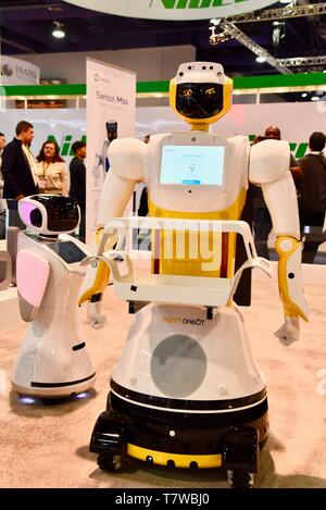 Sanbot Max robots, standing and offered as service robots, on display at CES, Las Vegas, USA Stock Photo