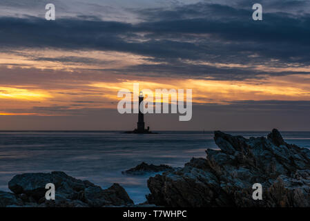 The lighthouse of La Hague, or Goury lighthouse, off Cap de la Hague, France, Manche, spring Stock Photo