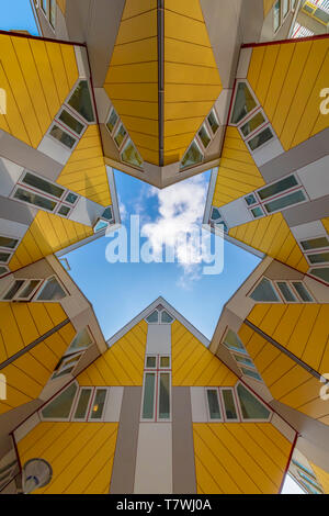 ROTTERDAM, 13 April 2019 - 360 degrees up view of the yellow cubic houses inner court showing the rectangular faces of the houses Stock Photo