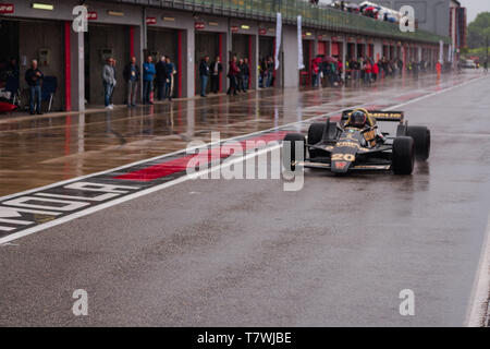the famous Wolf Racing WR7 is leaving the pitlane for a wet track Stock Photo