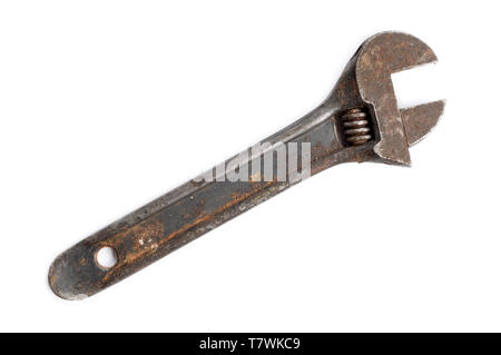 Old adjustable wrench on white background. Stock Photo