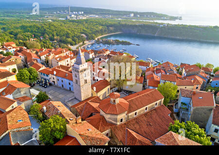 Town of Omisalj church and square aerial panoramic view, Krk island of Croatia Stock Photo