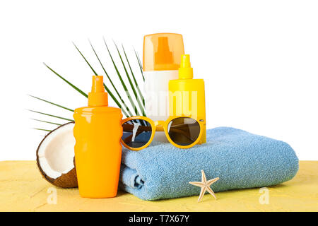 Summer vacation accessories on color table isolated on white background. Happy holidays Stock Photo
