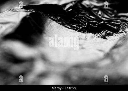Macro, absract  image of wrinkled aluminium foil packaging Stock Photo