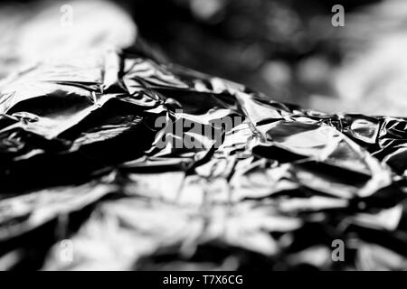 Macro, absract  image of wrinkled aluminium foil packaging Stock Photo