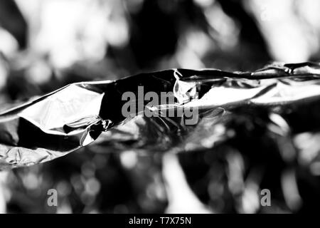 Macro, absract  image of wrinkled aluminium foil packaging Stock Photo
