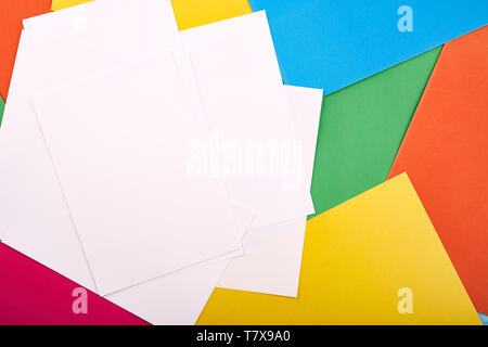 White papers for text on the background with colored cardboards. Preschool craft  kids concept Stock Photo