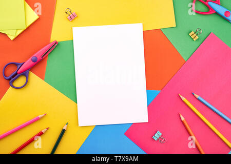 White papers for text on the background with colored cardboards. Preschool craft  kids concept Stock Photo