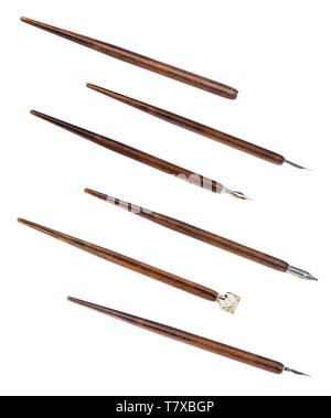 collection from brown penholders with various nibs isolated on white background Stock Photo