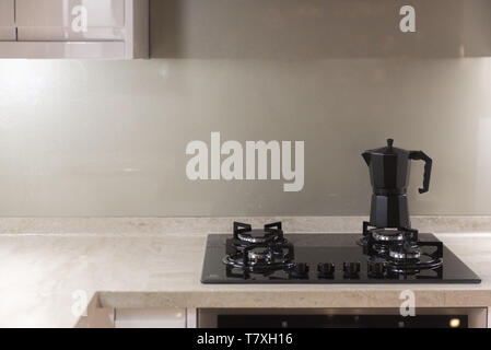 Traditional Coffee Pot on Contempory Classic Kitchen Stove Stock Photo