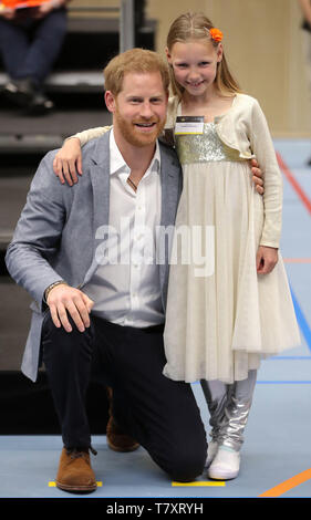 The Duke of Sussex with a competitors family member during a sports training session at Sportcampus Zuiderpark during a visit to The Hague as part of a programme of events to mark the official launch of the Invictus Games, Netherlands. Stock Photo