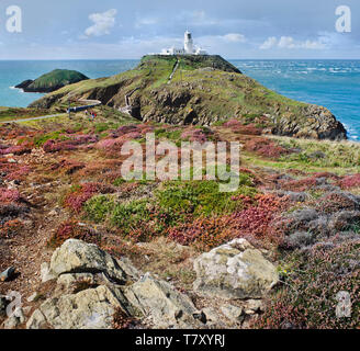 Strumble Head lighthouse stands on the rocky island of Ynys Meicl - or St Michaels Island Stock Photo