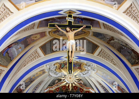 Jésus-Christ sur la croix. Eglise Saint-Nicolas de Véroce. Stock Photo