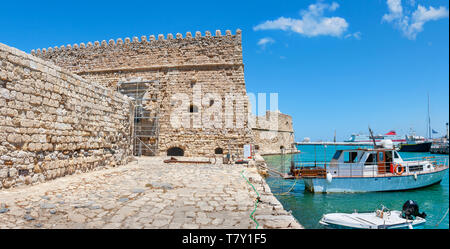 Panoramic view to Koules Fortress (Castello a Mare) in Heraklion harbour. Heraklion, Crete, Greece Stock Photo