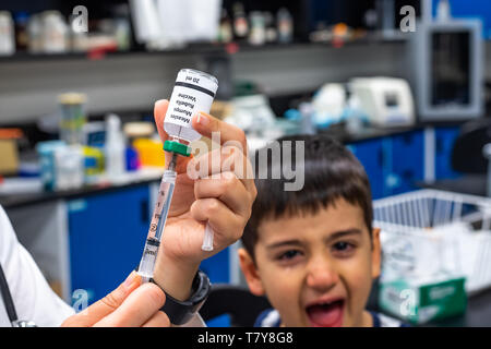Little Child Crying in Doctors Office stock photo Stock Photo
