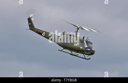 Bell UH-1 Iroquois 'Huey' flying at the season premiere at Shuttleworth on the 5 May 2019 Stock Photo