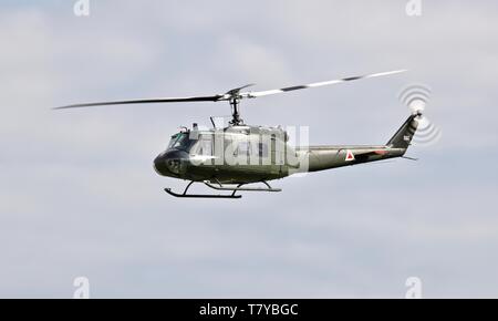 Bell UH-1 Iroquois 'Huey' flying at the season premiere at Shuttleworth on the 5 May 2019 Stock Photo