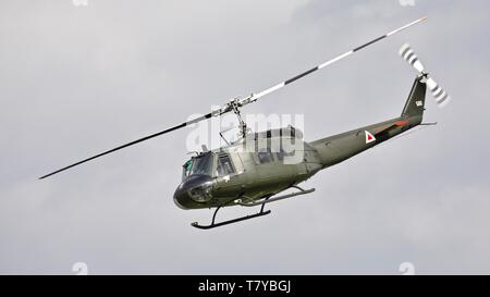 Bell UH-1 Iroquois 'Huey' flying at the season premiere at Shuttleworth on the 5 May 2019 Stock Photo