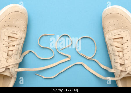 Women sneakers with laces in seo text. Stock Photo