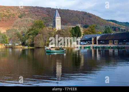 Fishermen setting off from Port of Menteith Fisheries on Lake of Menteith in the Trossachs, Scotland, UK Stock Photo