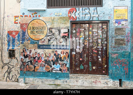 Havana Cuba, is a vibrant but rather decaying capital, .Hemingway was a drinker and now people sign the wall of La Bodeguita del Medio where he was a Stock Photo