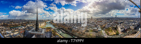 Aerial ultra wide Panorama cityscape of Paris. Skyline and famous landmarks central downtown buildings in the French capital. Stock Photo