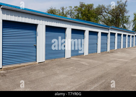 Numbered self storage and mini storage garage units Stock Photo