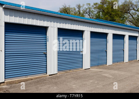 Numbered self storage and mini storage garage units Stock Photo