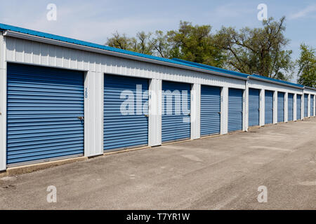 Numbered self storage and mini storage garage units Stock Photo