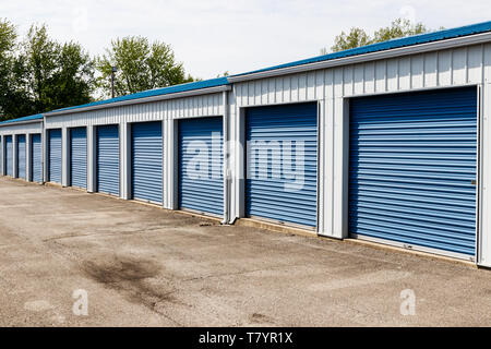 Numbered self storage and mini storage garage units Stock Photo