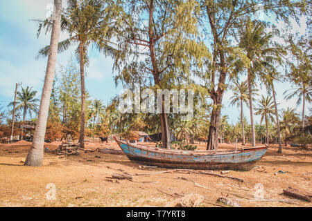 old wooden fisher boat on land , vintage fisherboat near beach Stock Photo