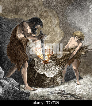 Early Humans Making Fire Stock Photo