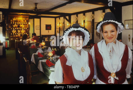 Traditionally dressed waitresses in a Welsh restaurant. Wales. Stock Photo