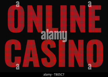 Online Casino word on dark screen, tv effect. Stock Photo