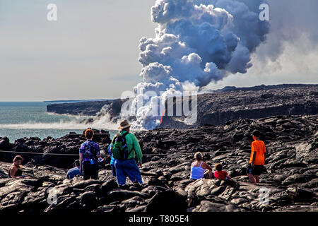 Tourists Watch Lava, Hawaii Stock Photo