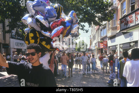 Balloon seller, Queens Street, Cardiff, Wales. Cymru. Circa 1980's Stock Photo