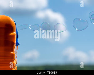 Childs mechanical soap bubble maker or blower Stock Photo