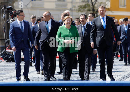 Sibiu, Romania. 9th May, 2019. Prime Minister of Bulgaria Boyko Borissov, Chancellor of Germany Angela Merkel and President of Romania Klaus Werner Iohannis walks to a family photo at the Informal Summit of Heads of State of government of the European Union in Sibiu, Romania. 9th May, 2019. Credit: JP Black/ZUMA Wire/Alamy Live News Stock Photo