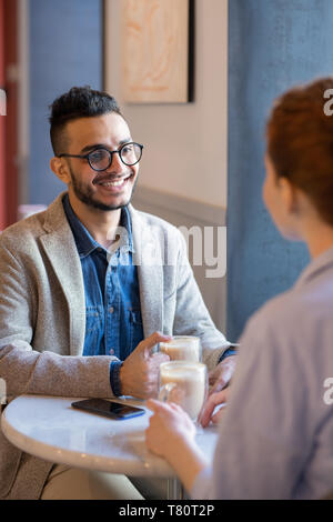 Having coffee with girlfriend Stock Photo
