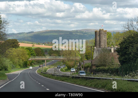 Dean Prior, South Devon, England, UK. May 2019. The A38 Devon Expressway and St George the Marty church overlooked by the Dartmoor National Park. Stock Photo