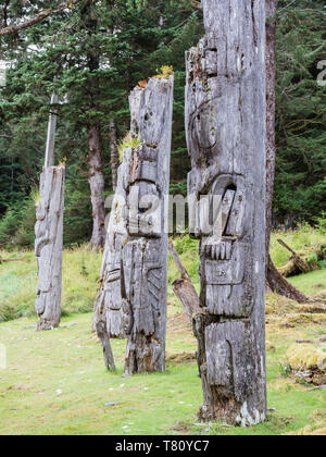 Totem poles at SGang Gwaay, UNESCO World Heritage Site, Haida Gwaii, British Columbia, Canada, North America Stock Photo