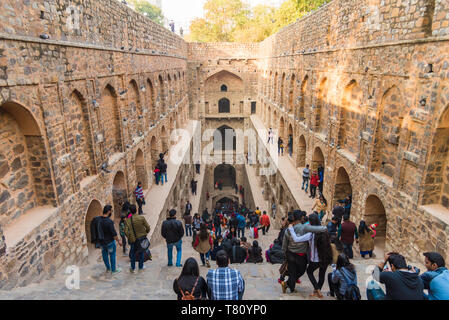 Groups of people at Agrasen ki Baoli, a historical step well on Hailey Road near Connaught Place, New Delhi, India, Asia Stock Photo