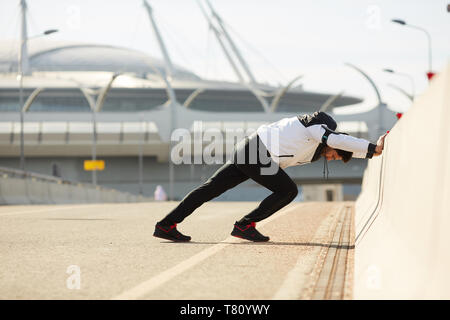 Exercising by border Stock Photo