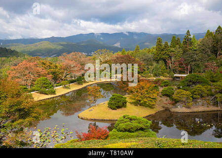 An aerial view of Yokuryuchi Pond surrounded by autumn foliage at the Shugakin Imperial Villa Garden, Kyoto, Japan, Asia Stock Photo