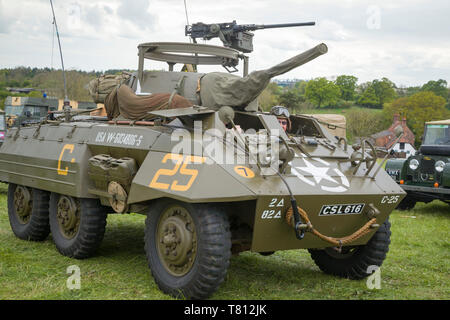 A fully restored WW2 American Military M8 Greyhound Scout Car at a classic car show. Stock Photo