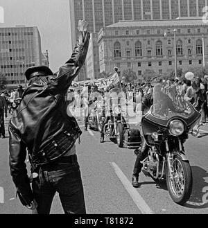 leather man raises his fist during the Gay Pride Parade in San Francisco on June 29th 1977 Stock Photo